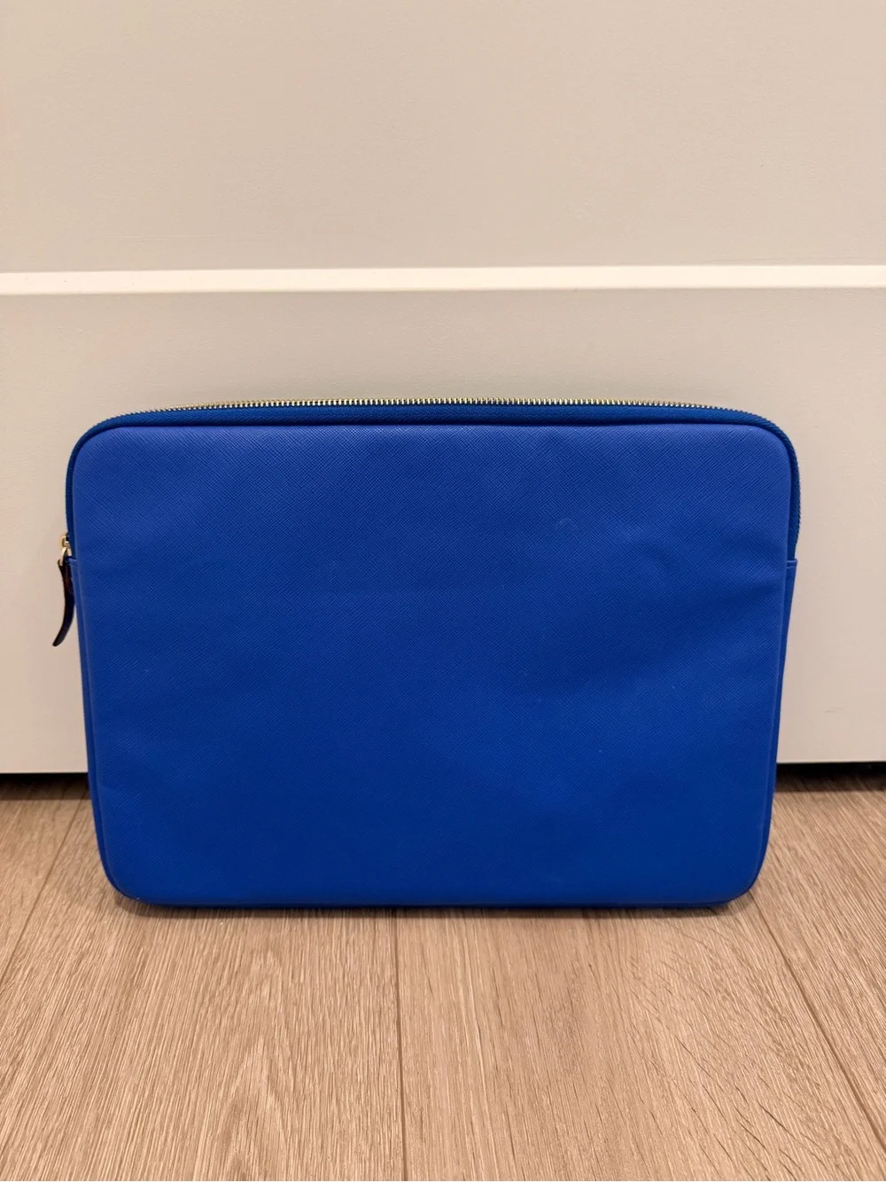 kate spade royal blue zip laptop sleeve with gold logo